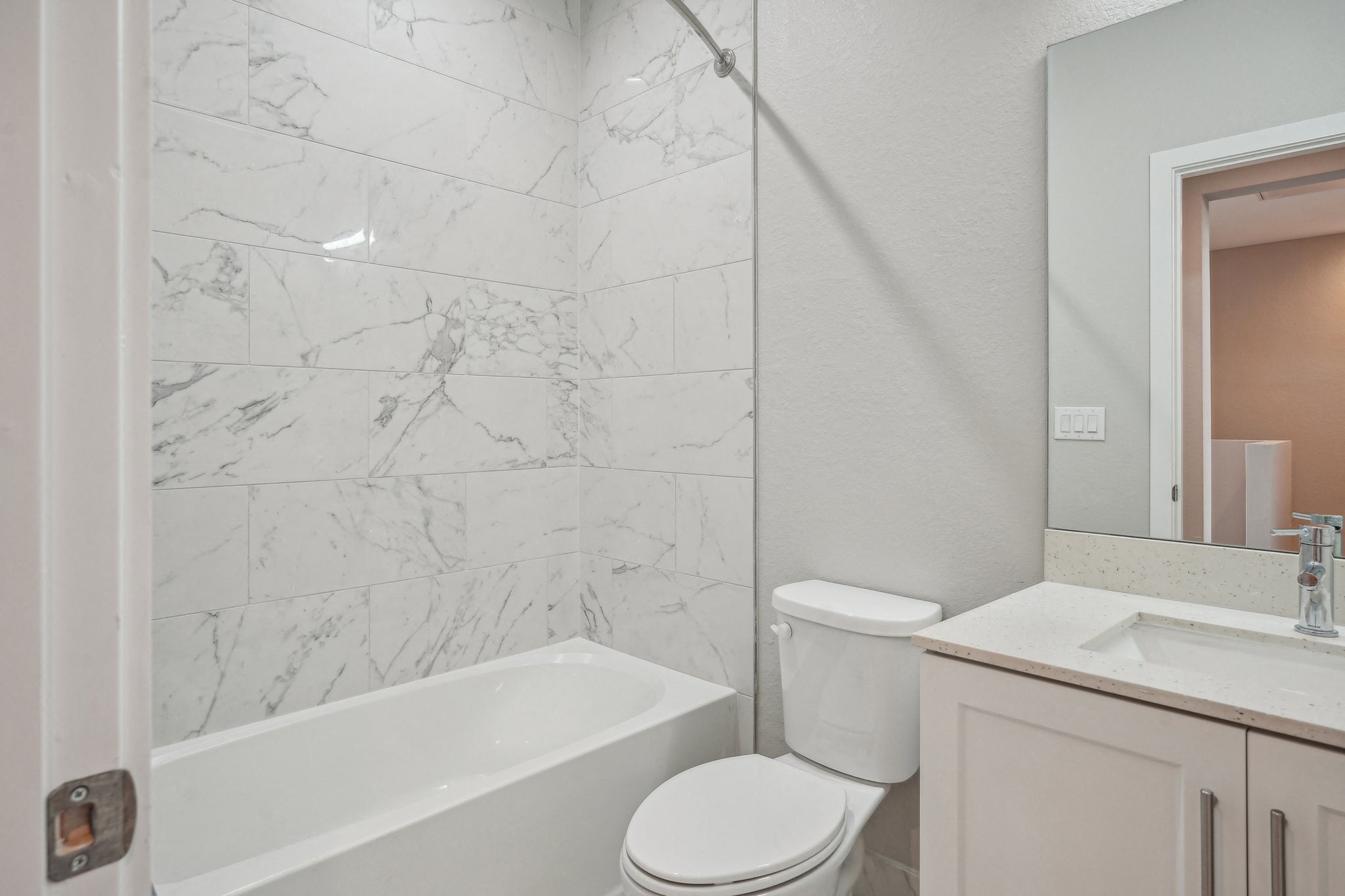 the preserve at ballantyne commons apartment bathroom with tub sink and toilet